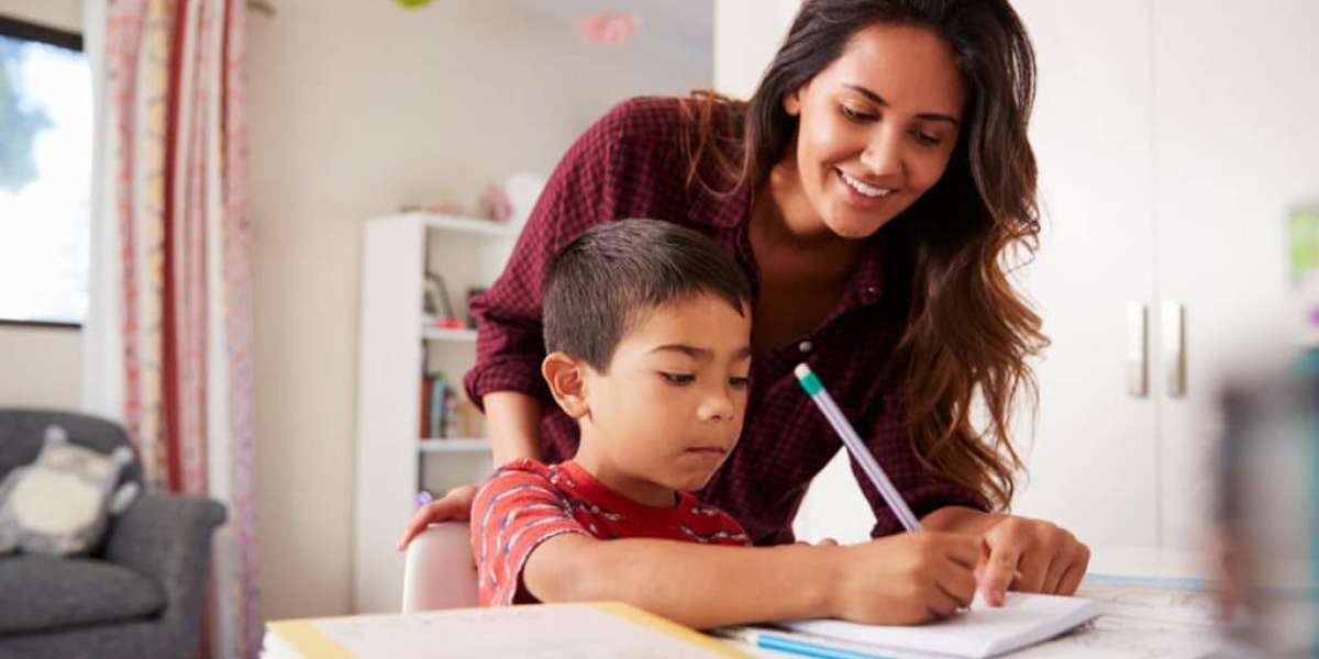 a woman helping a child with homework